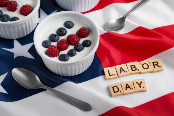 Millions of Americans celebrate Labor Day 2026 with travel, backyard barbecues, shopping, and community events.